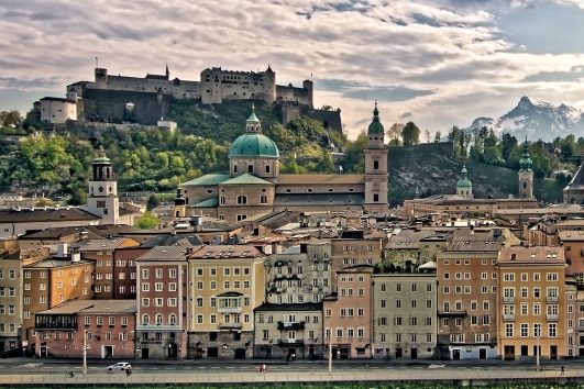 View of Salzburg old town with Hohensalzburg Fortress and the Alps in the background, Austria